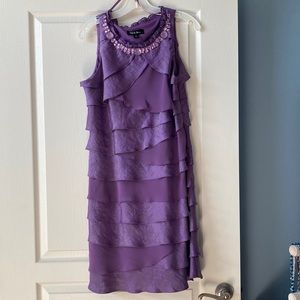 Special occasion dress purple with jeweled neckline and mixed media tiers.